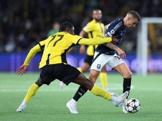 Lucas Digne of Aston Villa competes for the ball with Joel Monteiro of Young Boys Young Boys v Aston Villa, UEFA Champions League, Group Stage, Football, Wankdorf Stadium, Bern, Switzerland, 17 Sep 2024 EDITORIAL USE ONLY No use with unauthorised audio, video, data, fixture lists, club league logos or live services. Online in-match use limited to 120 images, no video emulation. No use in betting, games or single club league player publications. Copyright: xMichaelxZemanek Shutterstockx 14722110bk