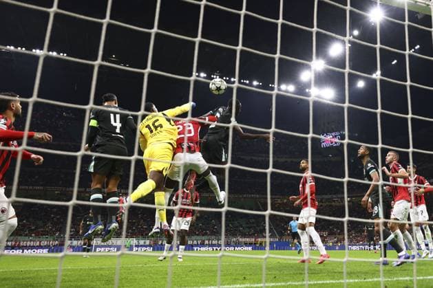 Ibrahima Konate of Liverpool scoring a goal (1-1) AC Milan v Liverpool, UEFA Champions League, Group Stage, Football, San Siro, Milan, Italy, 17 Sep 2024 EDITORIAL USE ONLY No use with unauthorised audio, video, data, fixture lists, club league logos or live services. Online in-match use limited to 120 images, no video emulation. No use in betting, games or single club league player publications. Copyright: xSimonxDael Shutterstockx 14722111ad