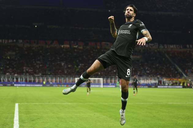 Dominik Szoboszlai of Liverpool celebrates after scoring a goal (1-3) AC Milan v Liverpool, UEFA Champions League, Group Stage, Football, San Siro, Milan, Italy, 17 Sep 2024 EDITORIAL USE ONLY No use with unauthorised audio, video, data, fixture lists, club league logos or live services. Online in-match use limited to 120 images, no video emulation. No use in betting, games or single club league player publications. Copyright: xSimonxDael Shutterstockx 14722111ao