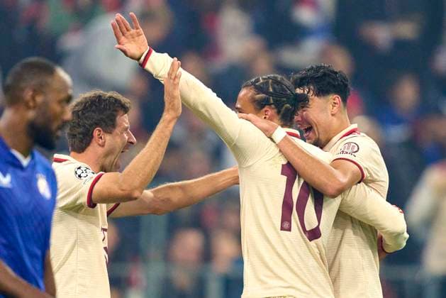 Leroy SANE, FCB 10 scores, shoots goal , Tor, Treffer, Torschuss, celebrates his goal, happy, laugh, celebration, with Aleksandar Pavlovic, FCB 45 Thomas MUELLER, MÜLLER, FCB 25 in the group league match FC BAYERN MUENCHEN - DINAMO ZAGREB 9-2 of football UEFA Champions League in season 2024 2025 in Munich, Sep 17, 2024 , FCB, 1. Spieltag, München