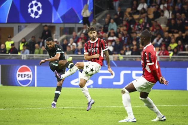 Ryan Gravenberch of Liverpool with a shot on goal under pressure from Christian Pulisic of Milan AC Milan v Liverpool, UEFA Champions League, Group Stage, Football, San Siro, Milan, Italy, 17 Sep 2024 EDITORIAL USE ONLY No use with unauthorised audio, video, data, fixture lists, club league logos or live services. Online in-match use limited to 120 images, no video emulation. No use in betting, games or single club league player publications. Copyright: xSimonxDael Shutterstockx 14722111dk