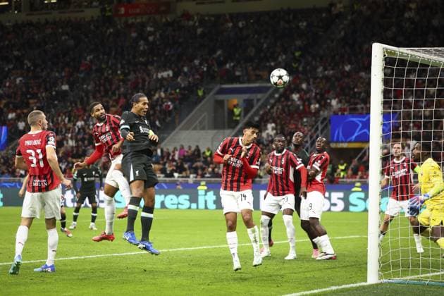 Virgil van Dijk of Liverpool scoring a goal (1-2) AC Milan v Liverpool, UEFA Champions League, Group Stage, Football, San Siro, Milan, Italy, 17 Sep 2024 EDITORIAL USE ONLY No use with unauthorised audio, video, data, fixture lists, club league logos or live services. Online in-match use limited to 120 images, no video emulation. No use in betting, games or single club league player publications. Copyright: xSimonxDael Shutterstockx 14722111cw