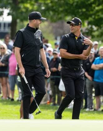 September 27, 2024, Montreal, Pq, CANADA: International team member Taylor Pendrith of Canada, left walks up the fairway with partner Adam Scott of Australia, on the first hole during their second round foursome match at the Presidents Cup golf tournament at the Royal Montreal Golf Club, in Montreal, Friday, Sept. 27, 2024. Canada News - September 27, 2024 - ZUMAc35_ 20240927_zaf_c35_106 Copyright: xChristinnexMuschix