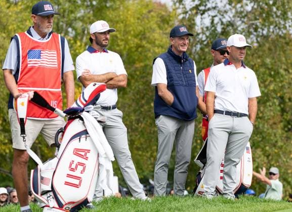September 27, 2024, Montreal, Pq, CANADA: United States team captain Jim Furyk, second right, watches play with team members Max Homa, second left, and Brian Harman, right, on the first hole during their second round foursome match at the Presidents Cup golf tournament at the Royal Montreal Golf Club, in Montreal, Friday, Sept. 27, 2024. Canada News - September 27, 2024 - ZUMAc35_ 20240927_zaf_c35_110 Copyright: xChristinnexMuschix