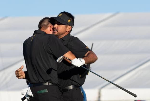 September 27, 2024, Montreal, Pq, CANADA: International team member Jason Day of Australia, right, is hugged by partner Christiaan Bezuidenhout of South Africa, as they defeat the United States team on the eighteenth hole of their second round foursome match at the Presidents Cup golf tournament at the Royal Montreal Golf Club, in Montreal, Friday, Sept. 27, 2024. Canada News - September 27, 2024 - ZUMAc35_ 20240927_zaf_c35_160 Copyright: xChristinnexMuschix