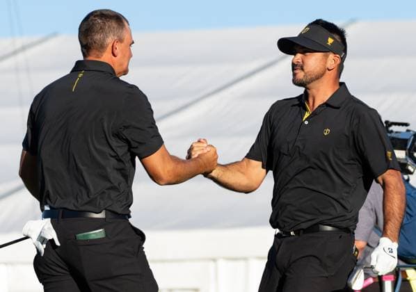 September 27, 2024, Montreal, Pq, CANADA: International team member Jason Day of Australia, right, and Christiaan Bezuidenhout of South Africa, celebrate after defeating the United States team on the eighteenth hole of their second round foursome match at the Presidents Cup golf tournament at the Royal Montreal Golf Club, in Montreal, Friday, Sept. 27, 2024. Canada News - September 27, 2024 - ZUMAc35_ 20240927_zaf_c35_161 Copyright: xChristinnexMuschix
