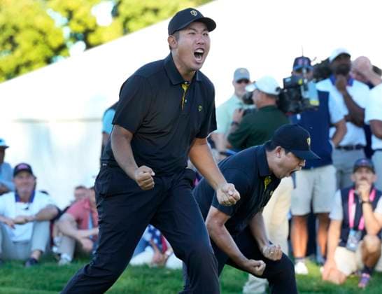 September 27, 2024, Montreal, Pq, Canada: International team member Si Woo Kim of South Korea, left, celebrates with partner International team member Byeong Hun An of South Korea, after sinking the winning putt on the 18th hole during second round foursome match at the Presidents Cup golf tournament at Royal Montreal Golf Club Friday, September 27, 2024 in Montreal. Si Woo Kim, Byeong Hun An, - ZUMAc35_ 20240927_zaf_c35_195 Copyright: xFrankxGunnx