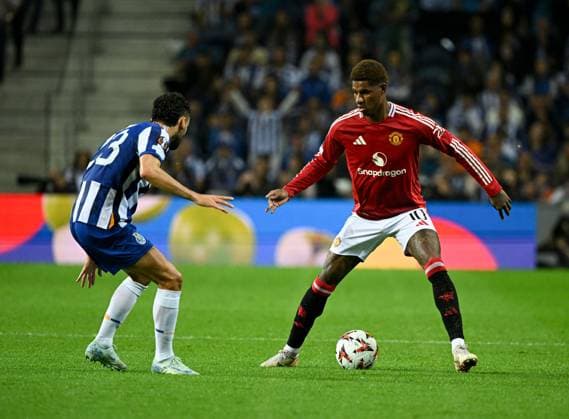 Joao Mario of Porto FC and Marcus Rashford of Manchester United, ManU Porto v Manchester United, UEFA Europa League, Group Stage, Football, Estadio do Dragao, Porto, Portugal, 03 Oct 2024 EDITORIAL USE ONLY No use with unauthorised audio, video, data, fixture lists, club league logos or live services. Online in-match use limited to 120 images, no video emulation. No use in betting, games or single club league player publications. Copyright: xZedxJameson Shutterstockx 14750815dn