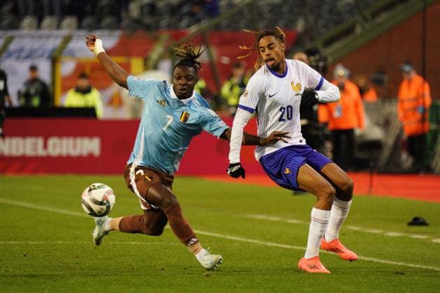 Jeremy Doku of Belgium battles with Bradley Barcola of France Belgium v France, UEFA Nations League, League A, Group 2, Football, Stade Roi Baudouin, Brussels, Belgium, 14 Oct 2024 EDITORIAL USE ONLY No use with unauthorised audio, video, data, fixture lists, club league logos or live services. Online in-match use limited to 120 images, no video emulation. No use in betting, games or single club league player publications. Copyright: xDavexWinter Shutterstockx 14783126r