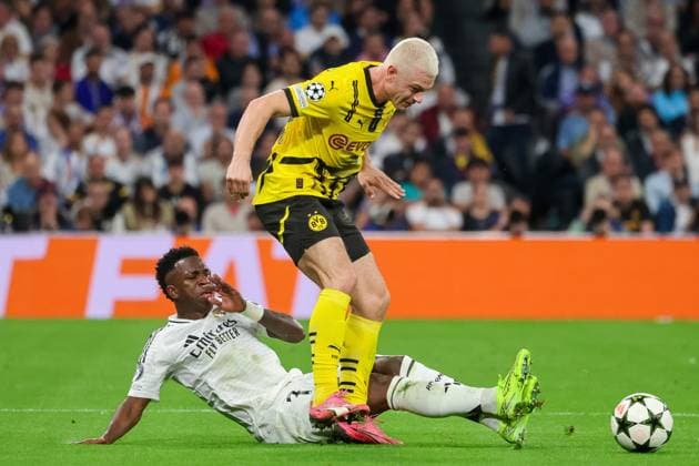 Julian Ryerson Dortmund 26 , Vinicius Junior Madrid 7 , ESP, Real Madrid vs Borussia Dortmund, Football, Champions League, Matchday 3, 2024 2025 season, 22 10 2024 ESP, Real Madrid vs Borussia Dortmund, Football, Champions League, Matchday 3, 2024 2025 season, 22 10 2024 Madrid Copyright: xEibner-Pressefoto JoergxNiebergax EP_JNL