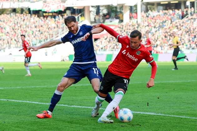 Budu Zivzivadze Karlsruher SC and Bartlomiej Wdowik Hannover 96 battle for the ball, 2 Bundesliga, Hannover 96 vs Karlsruher SC, Heinz von Heiden Arena, November 2, 2024 in Hanover, Germany Photo by Marco Steinbrenner DeFodi Images Budu Zivzivadze Karlsruher SC and Bartlomiej Wdowik Hannover 96 battle for the ball, 2 Bundesliga, Hannover 96 vs Karlsruher SC, Heinz von Heiden Arena, November 2, 2024 in Hanover, Germany Photo by Marco Steinbrenner DeFodi Images DFB DFL REGULATIONS PROHIBIT ANY USE OF PHOTOGRAPHS AS IMAGE SEQUENCES AND OR QUASI VIDEO not used in POL SRB CRO FRA GBR NED ITA USA Defodi 700 hannover ksc 20241102 019 Defodi-700 not used in POL SRB CRO FRA GBR NED ITA USA DFB DFL REGULATIONS PROHIBIT ANY USE OF PHOTOGRAPHS AS IMAGE SEQUENCES AND OR QUASI-VIDEO.