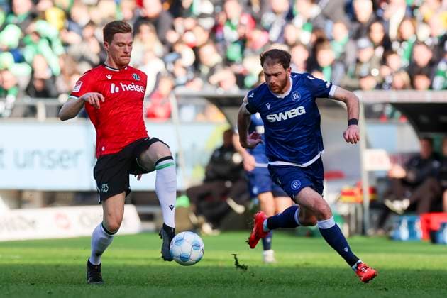Marcel Halstenberg Hannover 96 and Budu Zivzivadze Karlsruher SC battle for the ball, 2 Bundesliga, Hannover 96 vs Karlsruher SC, Heinz von Heiden Arena, November 2, 2024 in Hanover, Germany Photo by Marco Steinbrenner DeFodi Images Marcel Halstenberg Hannover 96 and Budu Zivzivadze Karlsruher SC battle for the ball, 2 Bundesliga, Hannover 96 vs Karlsruher SC, Heinz von Heiden Arena, November 2, 2024 in Hanover, Germany Photo by Marco Steinbrenner DeFodi Images DFB DFL REGULATIONS PROHIBIT ANY USE OF PHOTOGRAPHS AS IMAGE SEQUENCES AND OR QUASI VIDEO not used in POL SRB CRO FRA GBR NED ITA USA Defodi 700 hannover ksc 20241102 028 Defodi-700 not used in POL SRB CRO FRA GBR NED ITA USA DFB DFL REGULATIONS PROHIBIT ANY USE OF PHOTOGRAPHS AS IMAGE SEQUENCES AND OR QUASI-VIDEO.