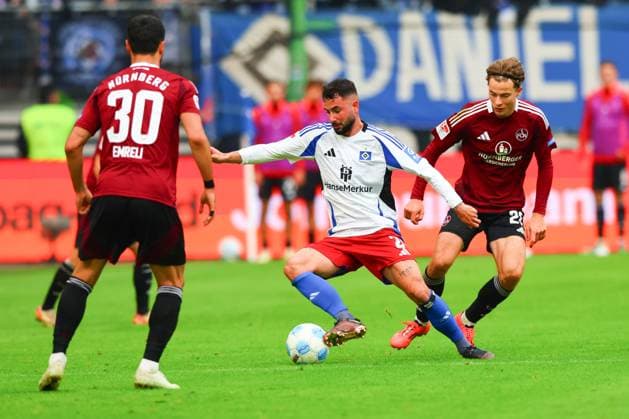 GER, Hamburg, Fußball, DFB, HSV vs 1 FC Nuernberg, im Volkspark Stadion, 03 11 2024, v l Mahir Emreli 1 FC Nuernberg , Marco Richter Hamburger SV , Caspar Jander 1 FC Nuernberg in aktion, in action DFL regulations prohibit any use of photographs as image sequences and or quasi video Copyright: HMBxMedia FernandoxSoares