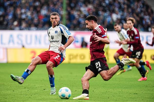 William Mikelbrencis Hamburger SV, 02 , Berkay Yilmaz 1 FC Nuernberg, 21 GER, Hamburger SV vs 1 FC Nuernberg, Football, 2 Bundesliga, Matchday 11, Season 2024 2025, 03 11 2024 DFL REGULATIONS PROHIBIT ANY USE OF PHOTOGRAPHS AS IMAGE SEQUENCES AND OR QUASI VIDEO GER, Hamburger SV vs 1 FC Nuernberg, Football, 2 Bundesliga, Matchday 11, Season 2024 2025, 03 11 2024 Hamburg Copyright: xEibner-Pressefoto MarcelxvonxFehrnx EP_MFN