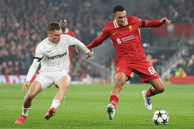 Trent Alexander-Arnold of Liverpool under pressure from Florian Wirtz of Bayer 04 Leverkusen Liverpool v Bayer 04 Leverkusen, UEFA Champions League, Group Stage, Football, Anfield, Liverpool, UK - 05 Nov 2024 EDITORIAL USE ONLY No use with unauthorised audio, video, data, fixture lists, club league logos or live services. Online in-match use limited to 120 images, no video emulation. No use in betting, games or single club league player publications. Copyright: xPaulxCurrie Shutterstockx 14863785aw