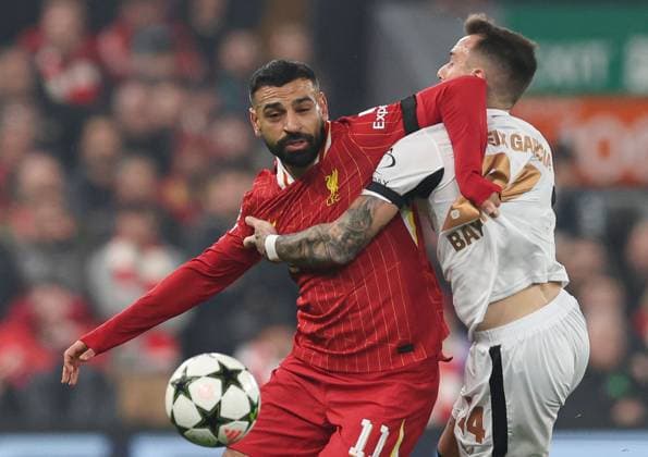 Mohamed Salah of Liverpool battles with Aleix Garcia of Bayer 04 Leverkusen Liverpool v Bayer 04 Leverkusen, UEFA Champions League, Group Stage, Football, Anfield, Liverpool, UK - 05 Nov 2024 EDITORIAL USE ONLY No use with unauthorised audio, video, data, fixture lists, club league logos or live services. Online in-match use limited to 120 images, no video emulation. No use in betting, games or single club league player publications. Copyright: xPaulxCurrie Shutterstockx 14863785be