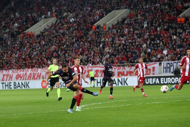 Cyriel Dessers of Rangers scores during the Europa League group phase match at the Stadio Georgios Karaiskakis, Athens. Olympiakos v Rangers, UEFA Europa League, Group Stage, Football, Georgios Karaiskakis Stadium, Pireas, Greece - 07 Nov 2024 EDITORIAL USE ONLY No use with unauthorised audio, video, data, fixture lists, club league logos or live services. Online in-match use limited to 120 images, no video emulation. No use in betting, games or single club league player publications. Copyright: xLukexNickerson RangersxFC Shutterstockx 14878765el