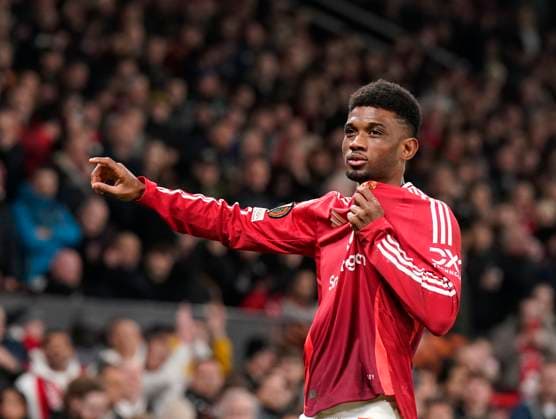 Manchester, England, 7th November 2024. Amad Diallo of Manchester United, ManU scores and celebrates scoring his sides opening goal during the UEFA Europa League match at Old Trafford, Manchester. Picture credit should read: Andrew Yates Sportimage EDITORIAL USE ONLY. No use with unauthorised audio, video, data, fixture lists, club league logos or live services. Online in-match use limited to 120 images, no video emulation. No use in betting, games or single club league player publications. SPI-3442-0043