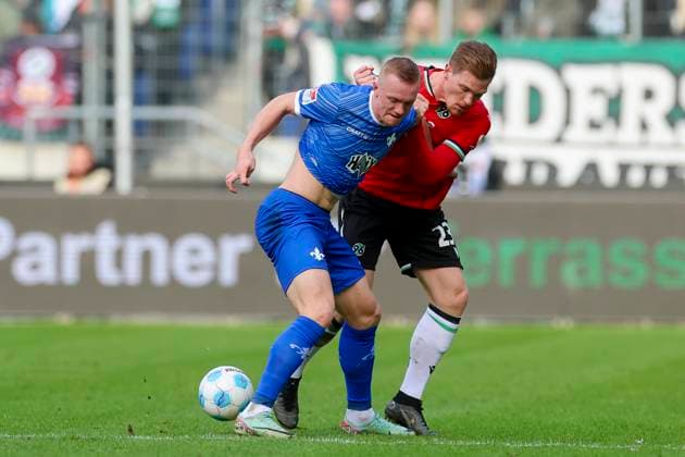 Isac Lidberg SV Darmstadt 98 and Marcel Halstenberg Hannover 96 battle for the ball, 2 Bundesliga, Hannover 96 vs SV Darmstadt 98, Heinz von Heiden Arena, November 23, 2024 in Hanover, Germany Photo by Marco Steinbrenner DeFodi Images Isac Lidberg SV Darmstadt 98 and Marcel Halstenberg Hannover 96 battle for the ball, 2 Bundesliga, Hannover 96 vs SV Darmstadt 98, Heinz von Heiden Arena, November 23, 2024 in Hanover, Germany Photo by Marco Steinbrenner DeFodi Images DFB DFL REGULATIONS PROHIBIT ANY USE OF PHOTOGRAPHS AS IMAGE SEQUENCES AND OR QUASI VIDEO Defodi 700 hannover darmstadt 20241123 027 Defodi-700 DFB DFL REGULATIONS PROHIBIT ANY USE OF PHOTOGRAPHS AS IMAGE SEQUENCES AND OR QUASI-VIDEO.