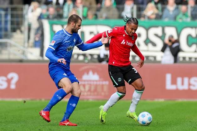 Aleksandar Vukotic SV Darmstadt 98 and Monju Momuluh Hannover 96 battle for the ball, 2 Bundesliga, Hannover 96 vs SV Darmstadt 98, Heinz von Heiden Arena, November 23, 2024 in Hanover, Germany Photo by Marco Steinbrenner DeFodi Images Aleksandar Vukotic SV Darmstadt 98 and Monju Momuluh Hannover 96 battle for the ball, 2 Bundesliga, Hannover 96 vs SV Darmstadt 98, Heinz von Heiden Arena, November 23, 2024 in Hanover, Germany Photo by Marco Steinbrenner DeFodi Images DFB DFL REGULATIONS PROHIBIT ANY USE OF PHOTOGRAPHS AS IMAGE SEQUENCES AND OR QUASI VIDEO Defodi 700 hannover darmstadt 20241123 030 Defodi-700 DFB DFL REGULATIONS PROHIBIT ANY USE OF PHOTOGRAPHS AS IMAGE SEQUENCES AND OR QUASI-VIDEO.