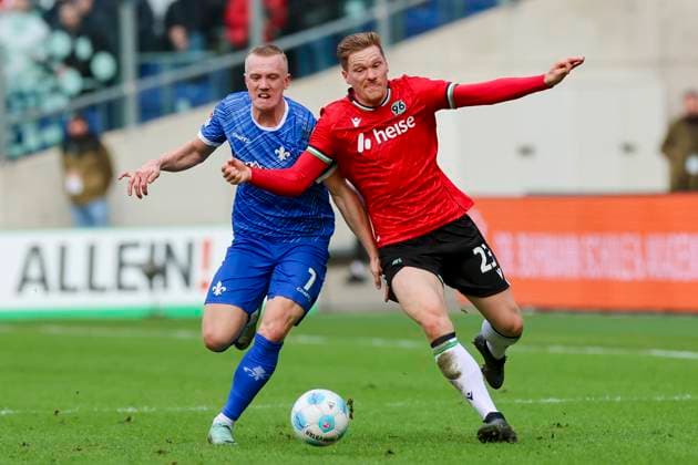 Isac Lidberg SV Darmstadt 98 and Marcel Halstenberg Hannover 96 battle for the ball, 2 Bundesliga, Hannover 96 vs SV Darmstadt 98, Heinz von Heiden Arena, November 23, 2024 in Hanover, Germany Photo by Marco Steinbrenner DeFodi Images Isac Lidberg SV Darmstadt 98 and Marcel Halstenberg Hannover 96 battle for the ball, 2 Bundesliga, Hannover 96 vs SV Darmstadt 98, Heinz von Heiden Arena, November 23, 2024 in Hanover, Germany Photo by Marco Steinbrenner DeFodi Images DFB DFL REGULATIONS PROHIBIT ANY USE OF PHOTOGRAPHS AS IMAGE SEQUENCES AND OR QUASI VIDEO Defodi 700 hannover darmstadt 20241123 048 Defodi-700 DFB DFL REGULATIONS PROHIBIT ANY USE OF PHOTOGRAPHS AS IMAGE SEQUENCES AND OR QUASI-VIDEO.