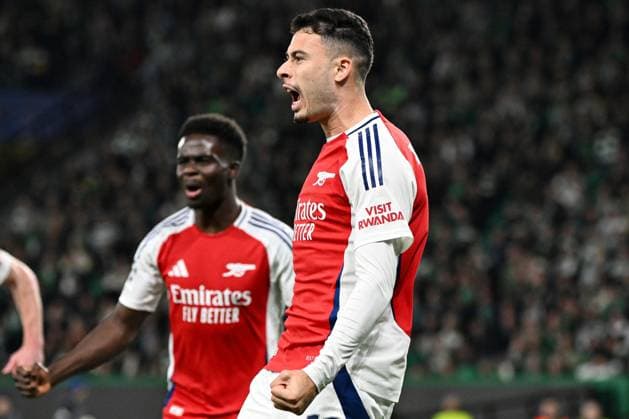 Gabriel Martinelli of Arsenal celebrates scoring the opening goal for their side with their teammates Sporting Lisbon v Arsenal, UEFA Champions League, Group Stage, Football, Estadio Jose Alvalade, Lisbon, Portugal - 26 Nov 2024 EDITORIAL USE ONLY No use with unauthorised audio, video, data, fixture lists, club league logos or live services. Online in-match use limited to 120 images, no video emulation. No use in betting, games or single club league player publications. Copyright: xZedxJameson Shutterstockx 14940177ag