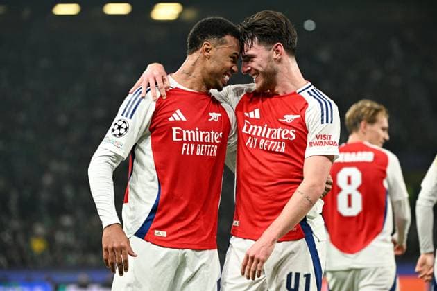 Gabriel Magalhaes of Arsenal (L) celebrates scoring the third goal with Declan Rice of Arsenal (R) Sporting Lisbon v Arsenal, UEFA Champions League, Group Stage, Football, Estadio Jose Alvalade, Lisbon, Portugal - 26 Nov 2024 EDITORIAL USE ONLY No use with unauthorised audio, video, data, fixture lists, club league logos or live services. Online in-match use limited to 120 images, no video emulation. No use in betting, games or single club league player publications. Copyright: xZedxJameson Shutterstockx 14940177ce