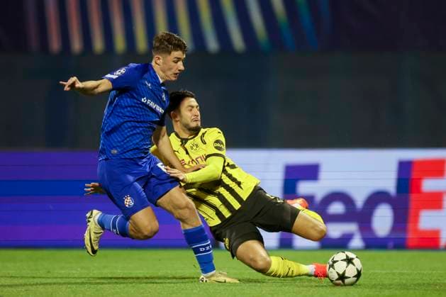 Branko Pavic GNK Dinamo and Ramy Bensebaini Borussia Dortmund battle for the ball, UEFA Champions League 2024 25 League Phase MD5, GNK Dinamo v Borussia Dortmund, Stadion Maksimir on November 27, 2024 in Zagreb, Croatia Photo by Marco Steinbrenner DeFodi Images Branko Pavic GNK Dinamo and Ramy Bensebaini Borussia Dortmund battle for the ball, UEFA Champions League 2024 25 League Phase MD5, GNK Dinamo v Borussia Dortmund, Stadion Maksimir, November 27, 2024 in Zagreb, Croatia Photo by Marco Steinbrenner DeFodi Images Defodi 700 zagreb bvb 20241127 039 Defodi-700