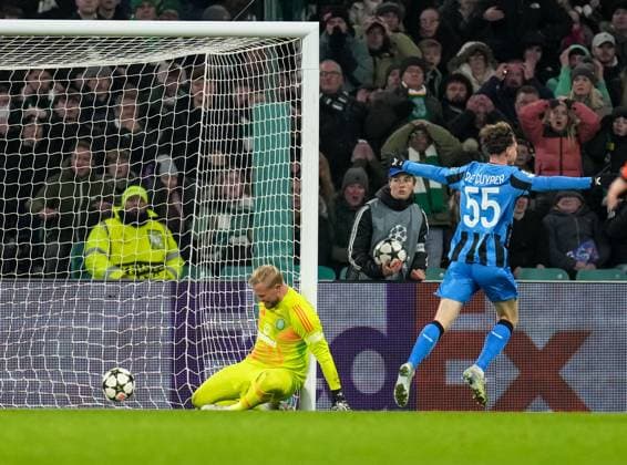 Maxim De Cuyper of Club Brugge celebrates as Cameron Carter-Vickers of Celtic scores an own goal past Celtic goalkeeper Kasper Schmeichel to give Club Brugge a 0-1 lead. Celtic v Club Brugge, UEFA Champions League, Group Stage, Football, Celtic Park, Glasgow, Scotland, UK - 27 Nov 2024 EDITORIAL USE ONLY No use with unauthorised audio, video, data, fixture lists, club league logos or live services. Online in-match use limited to 120 images, no video emulation. No use in betting, games or single club league player publications. Copyright: xStuartxWallace Shutterstockx 14945035az