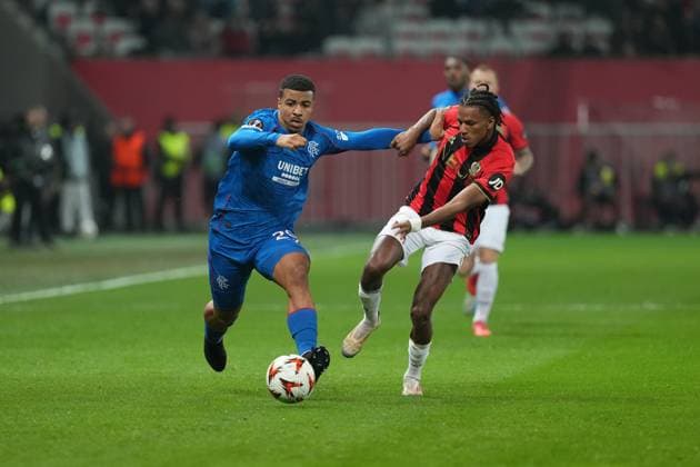 Hamza Igamane of Rangers takes on Hicham Boudaoui of Nice Nice v Rangers, UEFA Europa League, Group Stage, Football, Allianz Riviera, Nice, France - 28 Nov 2024 EDITORIAL USE ONLY No use with unauthorised audio, video, data, fixture lists, club league logos or live services. Online in-match use limited to 120 images, no video emulation. No use in betting, games or single club league player publications. Copyright: xDavexWinter Shutterstockx 14945054r