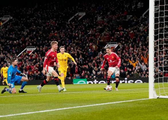 Manchester, England, 28th November 2024. Alejandro Garnacho of Manchester United, ManU scores the first goal during the UEFA Europa League match at Old Trafford, Manchester. Picture credit should read: Andrew Yates Sportimage EDITORIAL USE ONLY. No use with unauthorised audio, video, data, fixture lists, club league logos or live services. Online in-match use limited to 120 images, no video emulation. No use in betting, games or single club league player publications. SPI-3487-0019