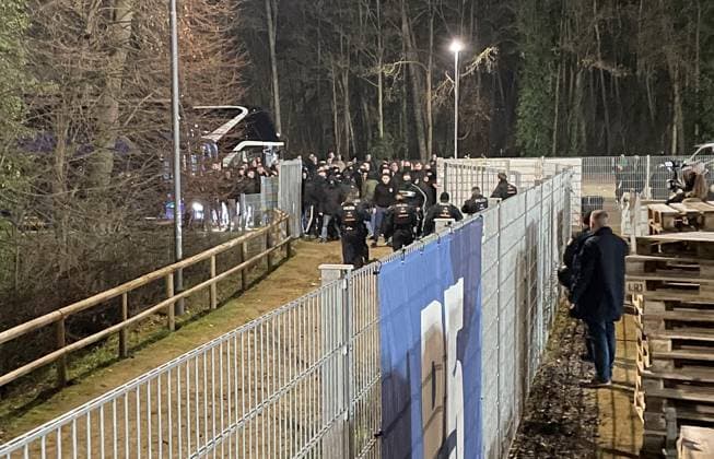 30 11 2024, xfux, Fußball 2 Bundesliga, SV Darmstadt 98 Preussen Münster, emspor, v l Fans or Ultras of Preußen Münster storm from the parking lot for guest fans towards the forest after the game The police are able to push some of the fans back into the parking lot Afterwards there is a confrontation with the police, which can finally push the fans back to the parking lot Obviously because there are not enough police forces and because of the cold, the fans are allowed to drive home without being checked despite the riots Fans, fan, fan block, Mood, scarf, scarves, flag, flags, emotion of SC Preußen Münster Preussen Muenster Violence, riot, riots, rioting, police, fan, fans, Ultras, hooligans, BFE, dog squad, masking, riot, fan riots, riots, rioting, brawl, Security, Sicherheitsdienst DFL DFB REGULATIONS PROHIBIT ANY USE OF PHOTOGRAPHS as IMAGE SEQUENCES and or QUASI VIDEO Licensing of the photographic work to and or by SV Darmstadt 1898 e V and subsidiaries is not permitted No release of or sale to SV Darmstadt 1898 e V Darmstadt