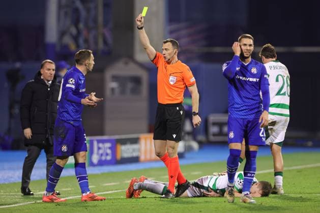 Marko Rog of Dinamo Zagreb receives a yellow card from Referee Felix Zwayer Dinamo Zagreb v Celtic, UEFA Champions League, Group Stage, Football, Maksimir Stadium, Zagreb, Croatia, UK - 10 Dec 2024 EDITORIAL USE ONLY No use with unauthorised audio, video, data, fixture lists, club league logos or live services. Online in-match use limited to 120 images, no video emulation. No use in betting, games or single club league player publications. Copyright: xNikolaxKrstic Shutterstockx 14984446az