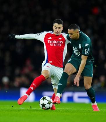 Gabriel Martinelli of Arsenal and Vanderson of Monaco Arsenal v Monaco, UEFA Champions League, Group Stage, Football, Emirates Stadium, London, UK - 11 Dec 2024 EDITORIAL USE ONLY No use with unauthorised audio, video, data, fixture lists, club league logos or live services. Online in-match use limited to 120 images, no video emulation. No use in betting, games or single club league player publications. Copyright: xJavierxGarcia Shutterstockx 14984979by