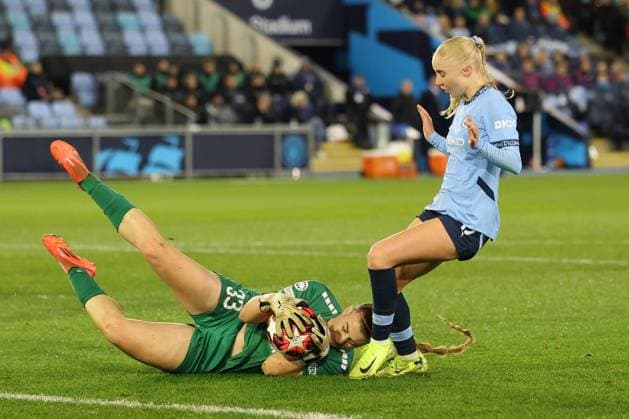 Carina Schlüter of St. Pölten saves from Laura Blindkilde of Manchester City Manchester City Women v St Polten Women, UEFA Women s Champions League, Group D, Football, Joie Stadium , Manchester, UK, 12 Dec 2024 EDITORIAL USE ONLY No use with unauthorised audio, video, data, fixture lists, club league logos or live services. Online in-match use limited to 120 images, no video emulation. No use in betting, games or single club league player publications. Copyright: xPaulxCurrie Shutterstockx 14985241ab