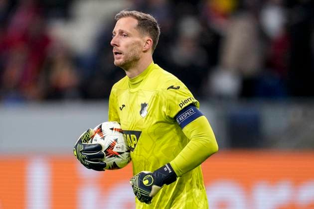 Oliver Baumann Goalkeeper, Hoffenheim, 1 , on the ball, single image, single photo, action, action, 12 12 2024, Sinsheim Germany , Football, UEFA Europa League, group stage, TSG 1899 Hoffenheim FCSB Bucharest, 12 12 2024, Sinsheim Germany , Football, UEFA Europa League, Group stage, TSG 1899 Hoffenheim FCSB Bucharest, DFB DFL REGULATIONS PROHIBIT ANY USE OF PHOTOGRAPHS AS IMAGE SEQUENCES AND OR QUASI VIDEO xozx