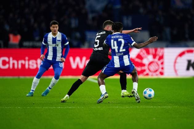 Deyovaisio Zeefuik Hertha BSC, 42 , Yassine Bouchama SC Preussen Muenster, 05 , GER, Hertha BSC vs SC Preussen Muenster, Soccer Men, 2 Bundesliga, Season 2024 2025, Matchday 16, 13 12 2024 DFL REGULATES PROHIBIT ANY USE OF PHOTOGRAPHS AS IMAGE SEQUENCES AND OR QUASI VIDEO GER, Hertha BSC vs SC Preussen Muenster, Soccer men, 2 Bundesliga, Season 2024 2025, 16 Matchday, 13 12 2024 Berlin Copyright: xEibner-Pressefotox xClaudiusxRauchx EP_CRH