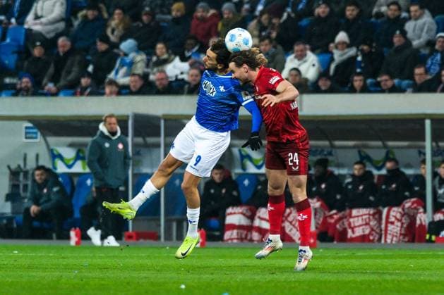 Fraser Hornby SV Darmstadt 98, 09 in duel with Jannis Heuer 1 FC Kaiserslautern, 24 , GER, SV Darmstadt 98 vs 1 FC Kaiserslautern, Soccer, 2 Bundesliga, Matchday 16, Season 2024 2025, 14 12 2024 DFL REGULATES PROHIBIT ANY USE OF PHOTOGRAPHS as IMAGE SEQUENCES and or QUASI VIDEO GER, SV Darmstadt 98 vs 1 FC Kaiserslautern, Football, 2 Bundesliga, Matchday 16, Season 2024 2025, 14 12 2024 Darmstadt Copyright: xEibner-Pressefoto FlorianxWieganx EP_FWD