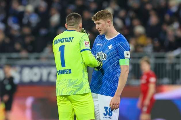 Goalkeeper Marcel Schuhen SV Darmstadt 98 and Clemens Riedel SV Darmstadt 98 talk together, 2 Bundesliga, SV Darmstadt 98 vs 1 FC Kaiserslautern, Merck Stadion am Böllenfalltor on December 14, 2024 in Darmstadt, Germany Photo by Marco Steinbrenner DeFodi Images Goalkeeper Marcel Schuhen SV Darmstadt 98 and Clemens Riedel SV Darmstadt 98 talk together, 2 Bundesliga, SV Darmstadt 98 vs 1 FC Kaiserslautern, Merck Stadion am Böllenfalltor, December 14, 2024 in Darmstadt, Germany Photo by Marco Steinbrenner DeFodi Images DFB DFL REGULATIONS PROHIBIT ANY USE OF PHOTOGRAPHS AS IMAGE SEQUENCES AND OR QUASI VIDEO Defodi 700 darm fck 20241214 007 Defodi-700 DFB DFL REGULATIONS PROHIBIT ANY USE OF PHOTOGRAPHS AS IMAGE SEQUENCES AND OR QUASI-VIDEO.
