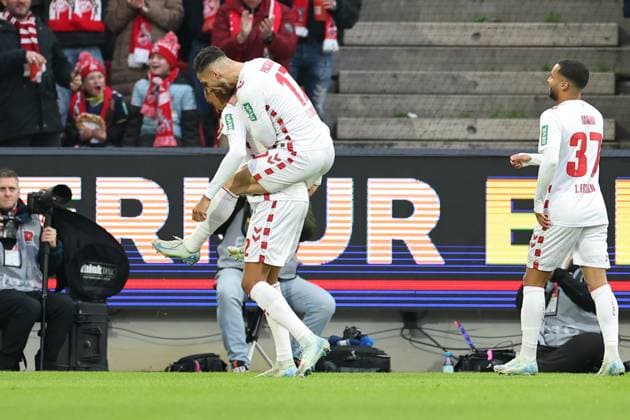 GER, 2 FBL, 1 FC Koeln vs 1 FC Nuernberg 15 12 2024, Rheinenergie Stadion, Koeln, GER, 2 FBL, 1 FC Koeln vs 1 FC Nuernberg, in the picture 1 0 for Koeln by Damion Downs FC Koeln 42 , goal celebration jubilation, Leart Paqarada FC Koeln 17 , Linton Maina FC Koeln 37 , nordphotoxGmbHx xMeuter nph00351