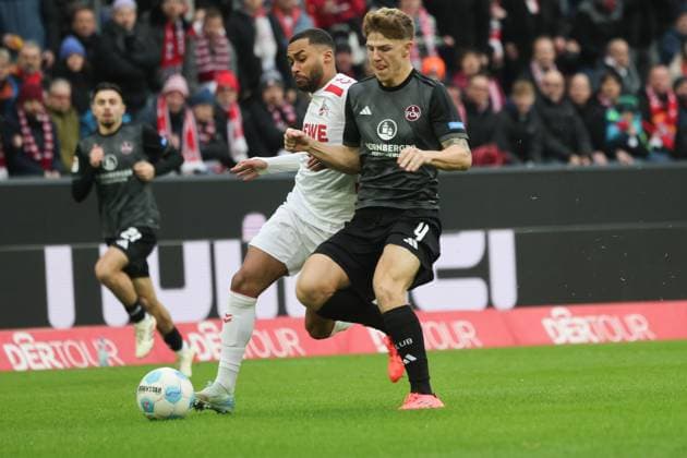 Linton Maina Koeln 37 and Finn Jeltsch Nuernberg 4 , GER, 1 FC Koeln vs 1 FC Nuernberg , 2 Soccer Bundesliga, Matchday 16, Season 2024 2025, 15 12 2024, DFL REGULATIONS PROHIBIT ANY USE OF PHOTOGRAPHS AS IMAGE SEQUENCES AND OR QUASI VIDEO, GER, 1 FC Koeln vs 1 FC Nuernberg , 2 Soccer Bundesliga, Matchday 16, Season 2024 2025, 15 12 2024 Koeln Copyright: xEibner-Pressefoto JoergxNiebergax EP_JNL
