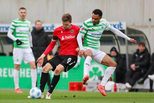 Fabian Kunze Hannover 96 and Julian Green SpVgg Greuther Fuerth battle for the ball, 2 Bundesliga, SpVgg Greuther Fürth vs Hannover 96, Sportpark Ronhof Thomas Sommer, December 15, 2024 in Fürth, Germany Photo by Marco Steinbrenner DeFodi Images Fabian Kunze Hannover 96 and Julian Green SpVgg Greuther Fuerth battle for the ball, 2 Bundesliga, SpVgg Greuther Fuerth vs Hannover 96, Sportpark Ronhof Thomas Sommer, December 15, 2024 in Fuerth, Germany Photo by Marco Steinbrenner DeFodi Images DFB DFL REGULATIONS PROHIBIT ANY USE OF PHOTOGRAPHS AS IMAGE SEQUENCES AND OR QUASI VIDEO Defodi 700 fuerth hannover 20241215 003 Defodi-700 DFB DFL REGULATIONS PROHIBIT ANY USE OF PHOTOGRAPHS AS IMAGE SEQUENCES AND OR QUASI-VIDEO.