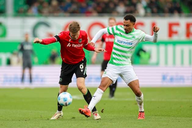Fabian Kunze Hannover 96 and Sacha Banse SpVgg Greuther Fuerth battle for the ball, 2 Bundesliga, SpVgg Greuther Fürth vs Hannover 96, Sportpark Ronhof Thomas Sommer, December 15, 2024 in Fürth, Germany Photo by Marco Steinbrenner DeFodi Images Fabian Kunze Hannover 96 and Sacha Banse SpVgg Greuther Fuerth battle for the ball, 2 Bundesliga, SpVgg Greuther Fuerth vs Hannover 96, Sportpark Ronhof Thomas Sommer, December 15, 2024 in Fuerth, Germany Photo by Marco Steinbrenner DeFodi Images DFB DFL REGULATIONS PROHIBIT ANY USE OF PHOTOGRAPHS AS IMAGE SEQUENCES AND OR QUASI VIDEO Defodi 700 fuerth hannover 20241215 026 Defodi-700 DFB DFL REGULATIONS PROHIBIT ANY USE OF PHOTOGRAPHS AS IMAGE SEQUENCES AND OR QUASI-VIDEO.