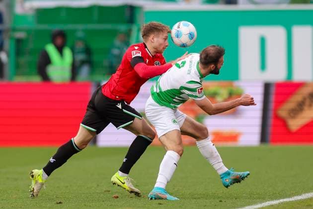 Jannik Dehm Hannover 96 and Simon Asta SpVgg Greuther Fuerth battle for the ball, 2 Bundesliga, SpVgg Greuther Fürth vs Hannover 96, Sportpark Ronhof Thomas Sommer, December 15, 2024 in Fürth, Germany Photo by Marco Steinbrenner DeFodi Images Jannik Dehm Hannover 96 and Simon Asta SpVgg Greuther Fuerth battle for the ball, 2 Bundesliga, SpVgg Greuther Fuerth vs Hannover 96, Sportpark Ronhof Thomas Sommer, December 15, 2024 in Fuerth, Germany Photo by Marco Steinbrenner DeFodi Images DFB DFL REGULATIONS PROHIBIT ANY USE OF PHOTOGRAPHS AS IMAGE SEQUENCES AND OR QUASI VIDEO Defodi 700 fuerth hannover 20241215 037 Defodi-700 DFB DFL REGULATIONS PROHIBIT ANY USE OF PHOTOGRAPHS AS IMAGE SEQUENCES AND OR QUASI-VIDEO.