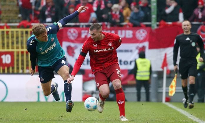 Timo Hübers 4, FC Köln , Luca Sirch 31, FC Kaiserslautern 22 12 2024, Football, 2 Bundesliga, 1 FC Kaiserslautern 1 FC Köln, 17 Matchday, Season 2024 25, Fritz Walter Stadion, Kaiserslautern, Germany, zmdz, DFB DFL regulations prohibit any use of photographs as image sequences and or quasi video 1 FC Kaiserslautern 1 FC Köln