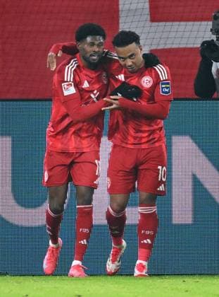 Football, 2 Bundesliga, Germany, Men, Season 2024 2025, Matchday 18, Merkur Spiel Arena Düsseldorf, Fortuna Düsseldorf SV Darmstadt 2 2 Cheers Myron van Brederode F95 after his goal for 1 0, together with Moritz Kwarteng F95 Cheers, joy, action