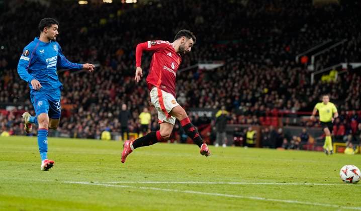 Manchester, England, 23rd January 2025. Bruno Fernandes of Manchester United, ManU (C) scores his teams second goal during the UEFA Europa League match at Old Trafford, Manchester. Picture credit should read: Andrew Yates Sportimage EDITORIAL USE ONLY. No use with unauthorised audio, video, data, fixture lists, club league logos or live services. Online in-match use limited to 120 images, no video emulation. No use in betting, games or single club league player publications. SPI_023_AY_MAN_UTD_RANGERS SPI-3616-0023