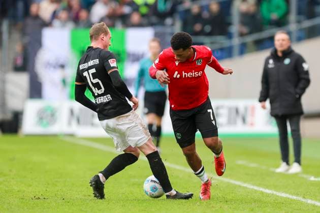 Simon Scherder SC Preussen Muenster and Jessic Ngankam Hannover 96 battle for the ball, 2 Bundesliga, Hannover 96 vs Preußen Münster, Heinz von Heiden Arena, January 26, 2025 in Hanover, Germany Photo by Marco Steinbrenner DeFodi Images Simon Scherder SC Preussen Muenster and Jessic Ngankam Hannover 96 battle for the ball, 2 Bundesliga, Hannover 96 vs Preußen Münster, Heinz von Heiden Arena, January 26, 2025 in Hanover, Germany Photo by Marco Steinbrenner DeFodi Images DFB DFL REGULATIONS PROHIBIT ANY USE OF PHOTOGRAPHS AS IMAGE SEQUENCES AND OR QUASI VIDEO Defodi 700 hannover muenster 20250126 042 Defodi-700 DFB DFL REGULATIONS PROHIBIT ANY USE OF PHOTOGRAPHS AS IMAGE SEQUENCES AND OR QUASI-VIDEO.