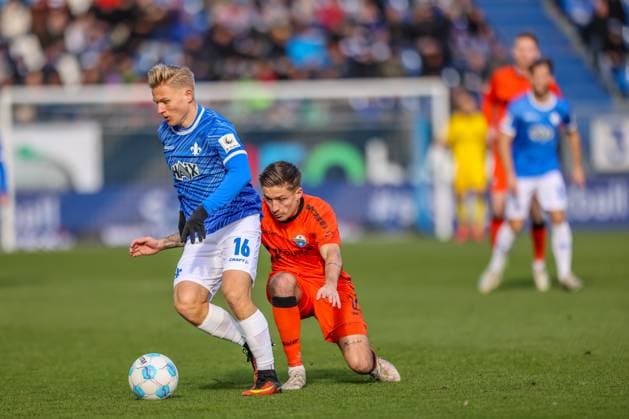GER, Darmstadt, SV Darmstadt 98 vs SC Paderborn, 2 Bundesliga, Football, DFB, Season 2024 2025, Merck Stadion am Böllenfalltor, Matchday 19, pictured from l Andreas Müller SV Darmstadt 98 16 , Marvin Mehlem SC Paderborn 6 DFB DFL REGULATIONS PROHIBIT ANY USE OF PHOTOGRAPHS AS IMAGE SEQUENCES AND OR QUASI VIDEO, 14 12 2024, Copyright: HMBxMedia HendrikxHamelau