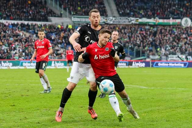 Torge Paetow SC Preussen Muenster and Enzo Leopold Hannover 96 battle for the ball, 2 Bundesliga, Hannover 96 vs Preußen Münster, Heinz von Heiden Arena, January 26, 2025 in Hanover, Germany Photo by Marco Steinbrenner DeFodi Images Torge Paetow SC Preussen Muenster and Enzo Leopold Hannover 96 battle for the ball, 2 Bundesliga, Hannover 96 vs Preußen Münster, Heinz von Heiden Arena, January 26, 2025 in Hanover, Germany Photo by Marco Steinbrenner DeFodi Images DFB DFL REGULATIONS PROHIBIT ANY USE OF PHOTOGRAPHS AS IMAGE SEQUENCES AND OR QUASI VIDEO Defodi 700 hannover muenster 20250126 048 Defodi-700 DFB DFL REGULATIONS PROHIBIT ANY USE OF PHOTOGRAPHS AS IMAGE SEQUENCES AND OR QUASI-VIDEO.